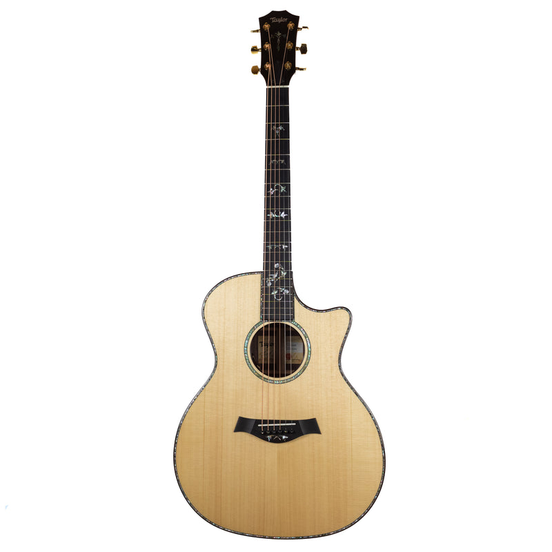 Acoustic guitar with a cutaway on a white background